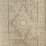 فرش ماشینی 700 شانه طرح ارغوان کرم کد 71200-nt - نمای نزدیک از گل‌های ظریف طرح ارغوان در بافت فرش - تصویر شماره 1